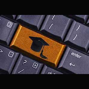 Graphic of cap and gown on a computer keyboard