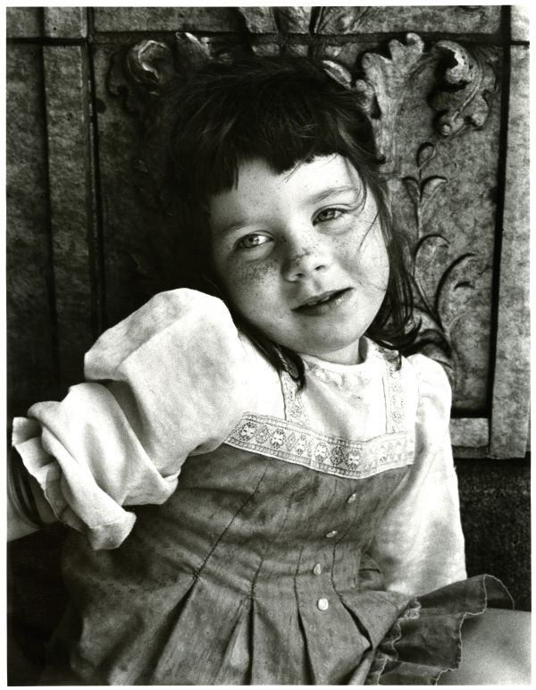 Image of four year old girl looking at camera.