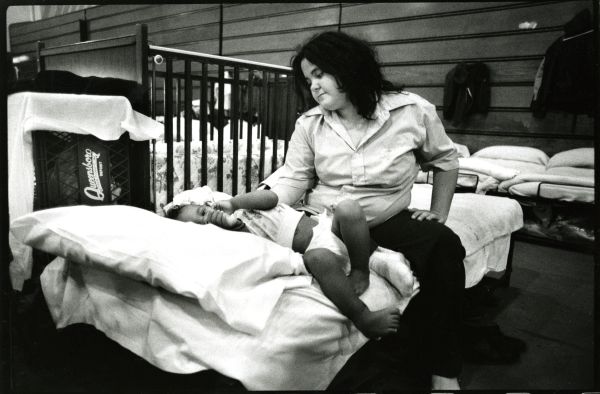 Image of a mother and child at a homeless shelter.