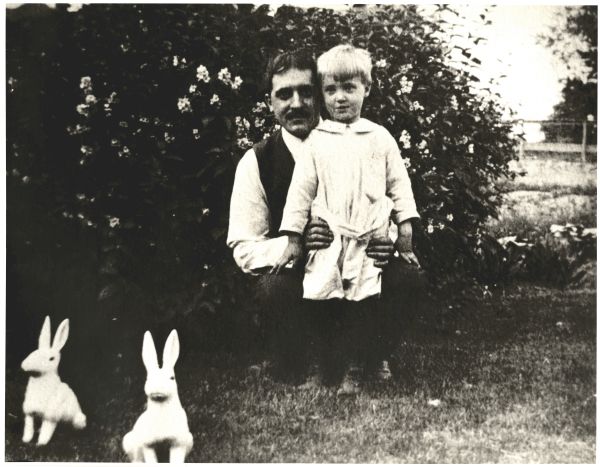 Image of Boy and Father with Rabbits