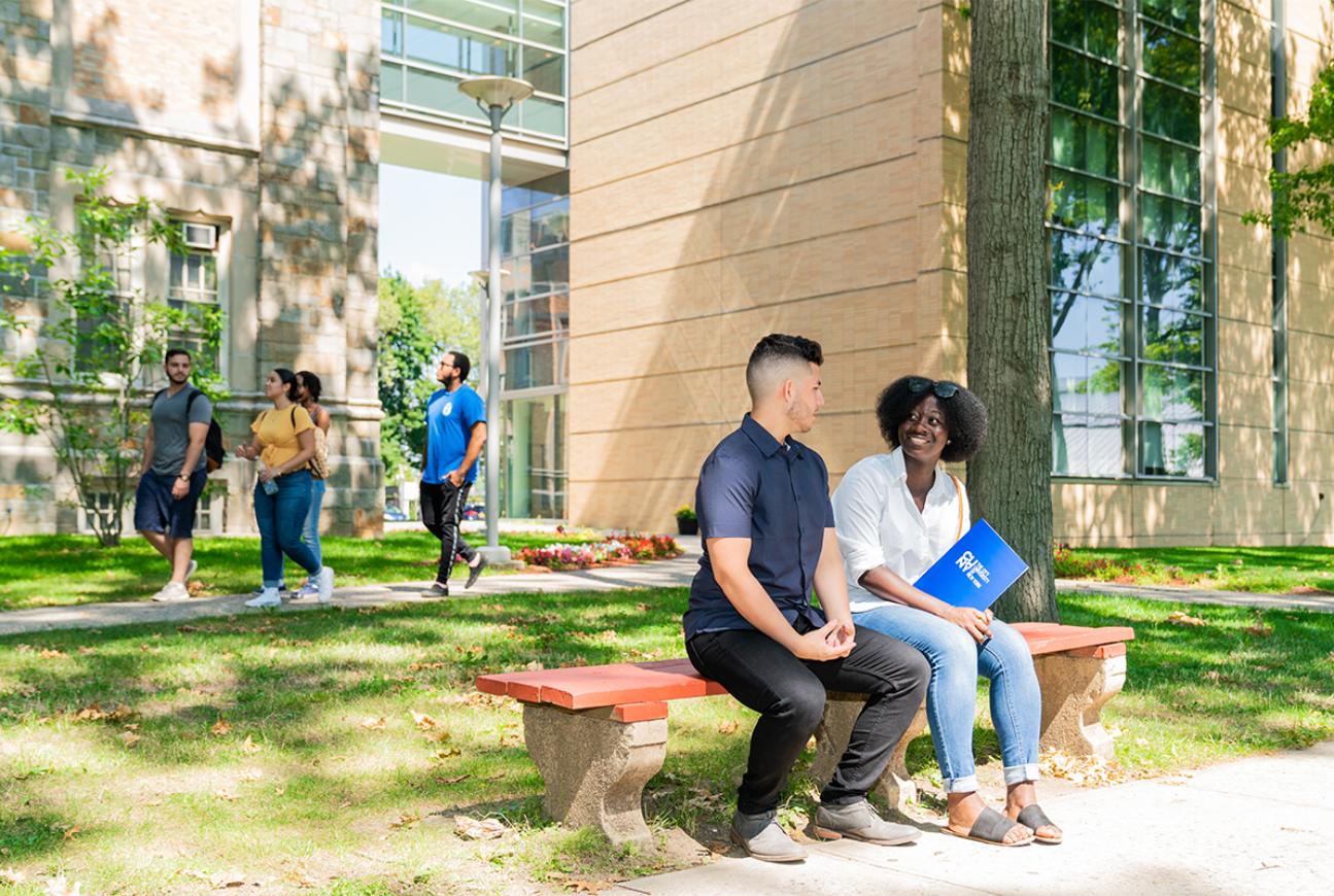 Students sitting on a bench