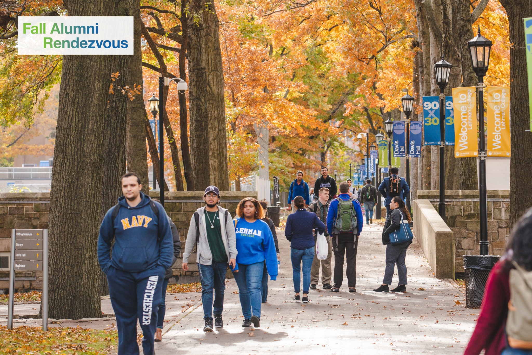 People walking on Lehman College campus during the Fall.
