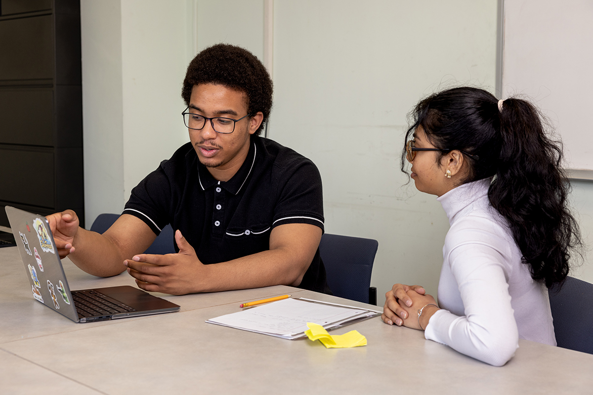 Photo of two students in study session