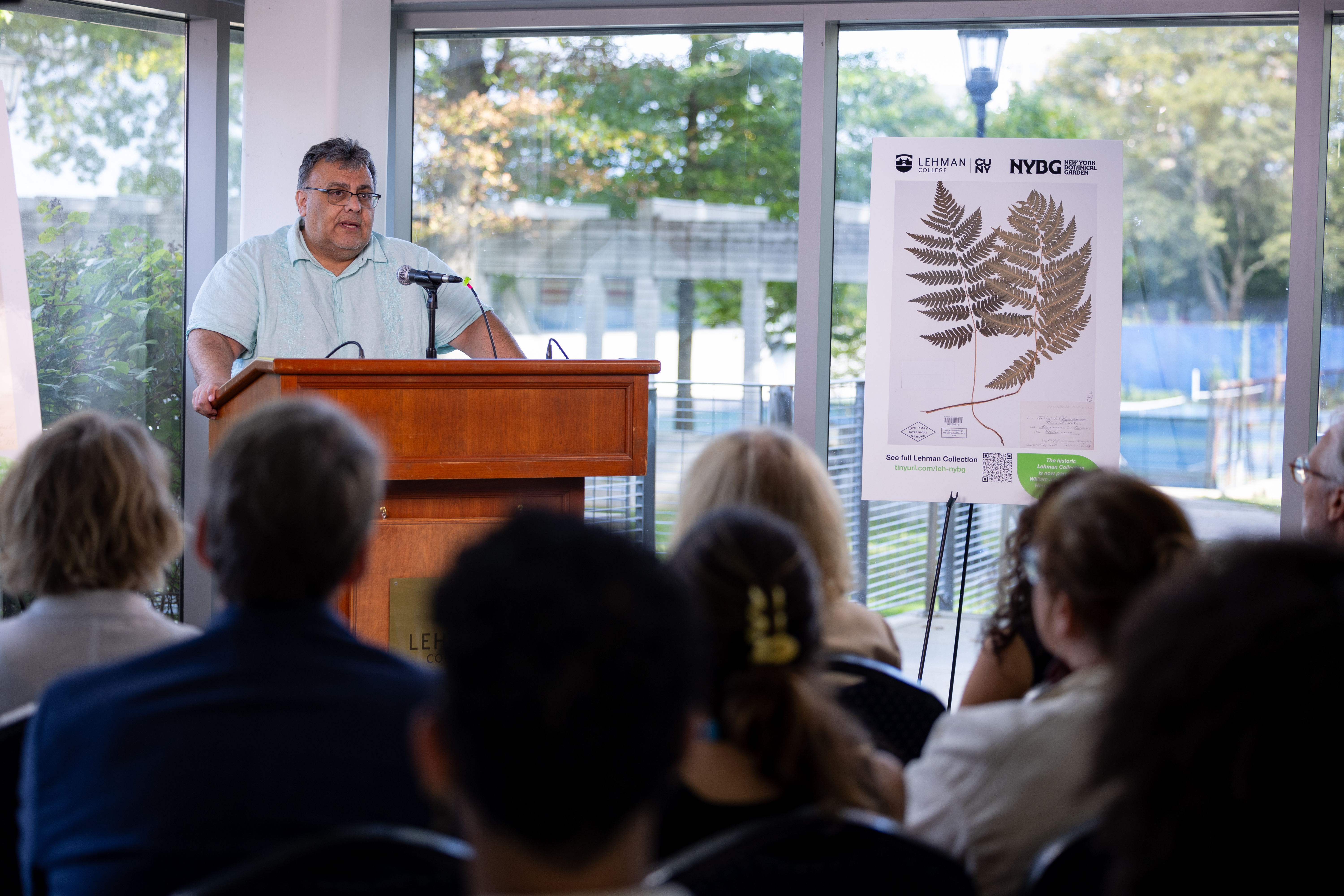 President Delgado speaks to the audience at the handoff.