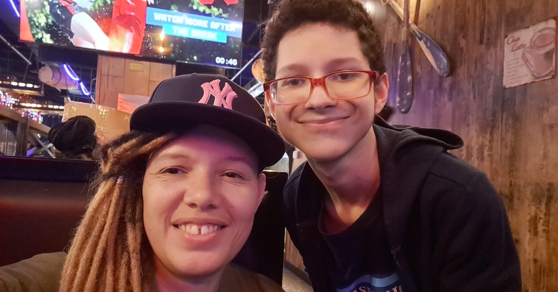 Lennyn Jacob anLennyn Jacob and her teenaged son pose for a selfie.