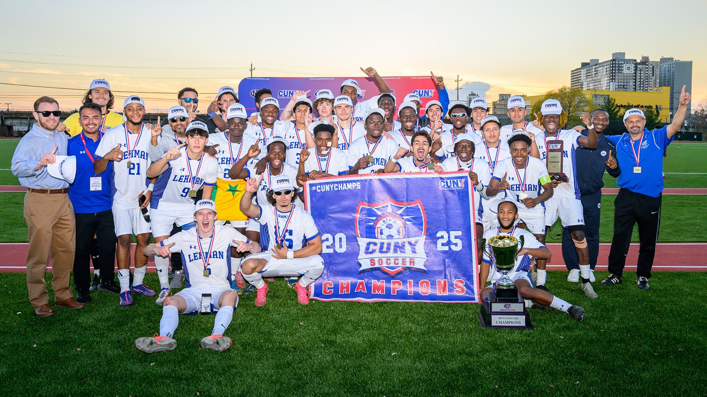 Lehman Lighning Men's Soccer Team displaying CUNYAC championship banner and cup.