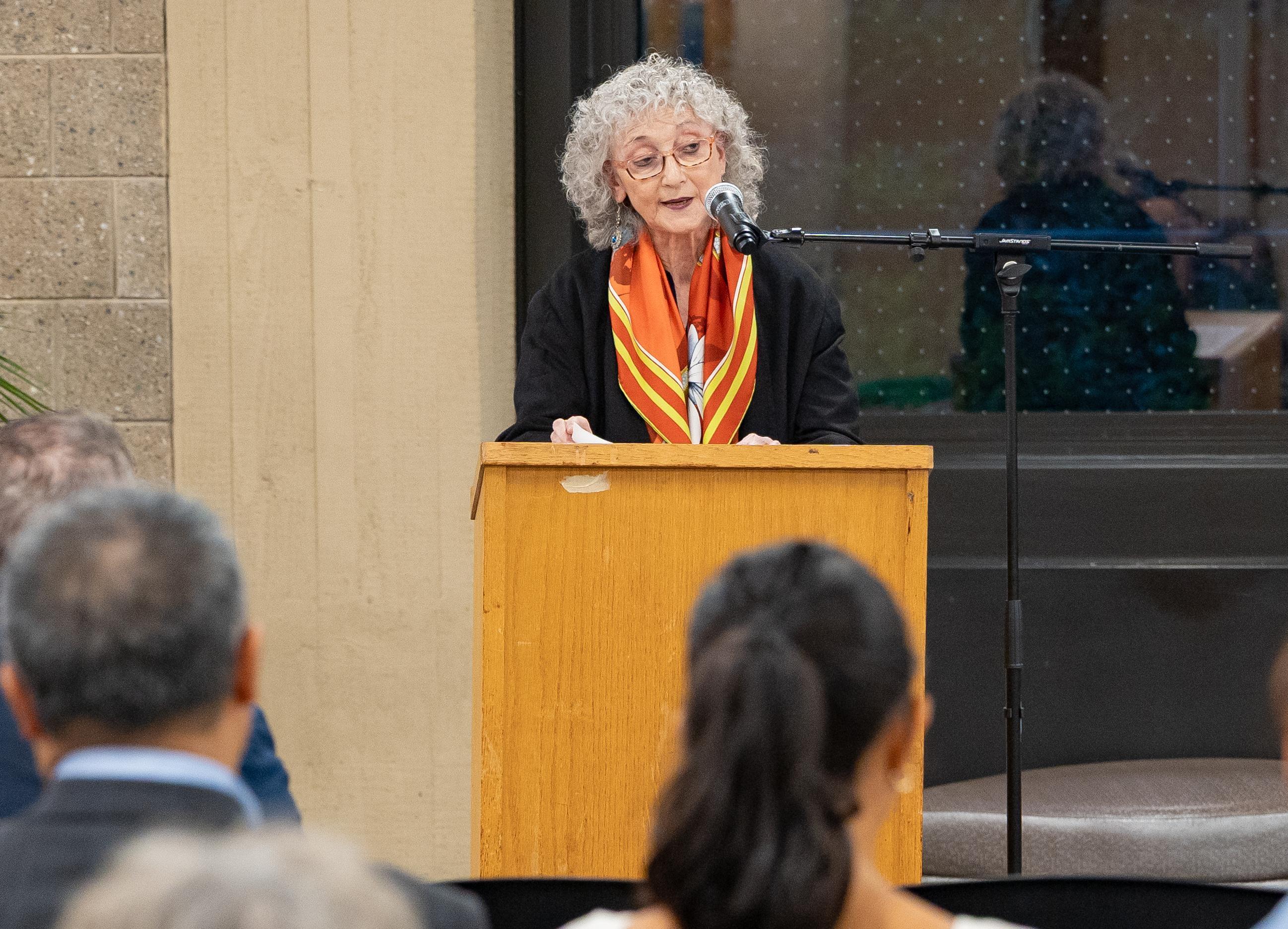 Marguerite Zappa, curator and former student of Joseph Tusiani, delivers remarks during the event honoring the beloved professor.