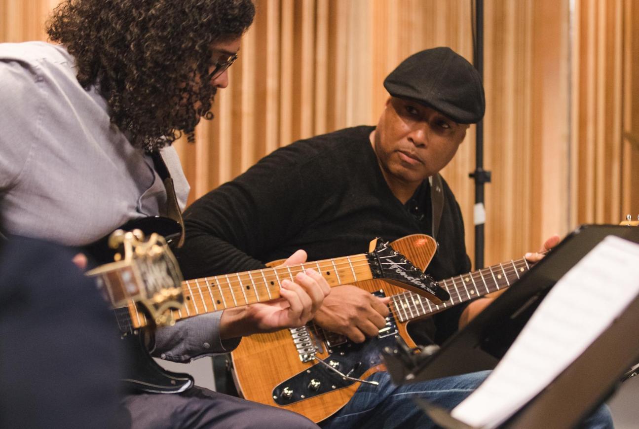 Two Guitarist Play Together