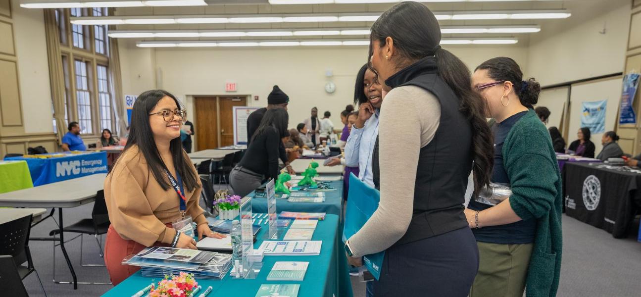 Student at an information table