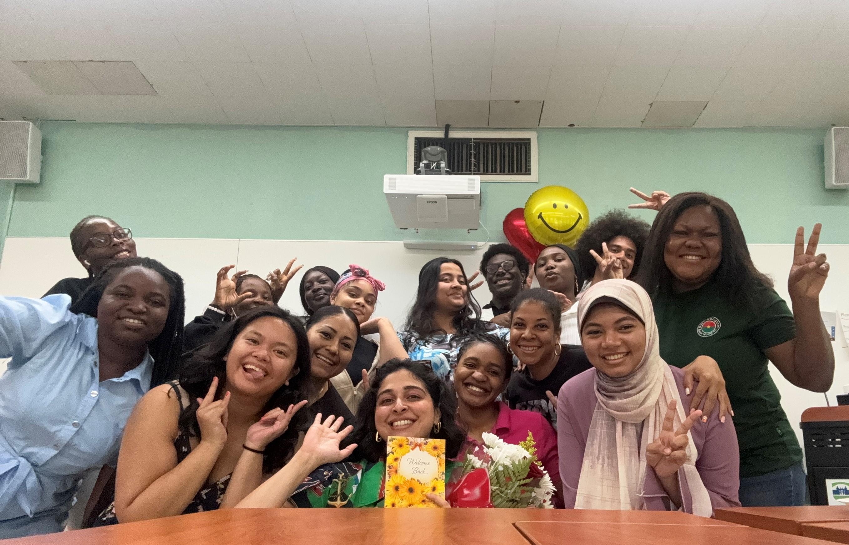 A group of students posing after their summer workshop