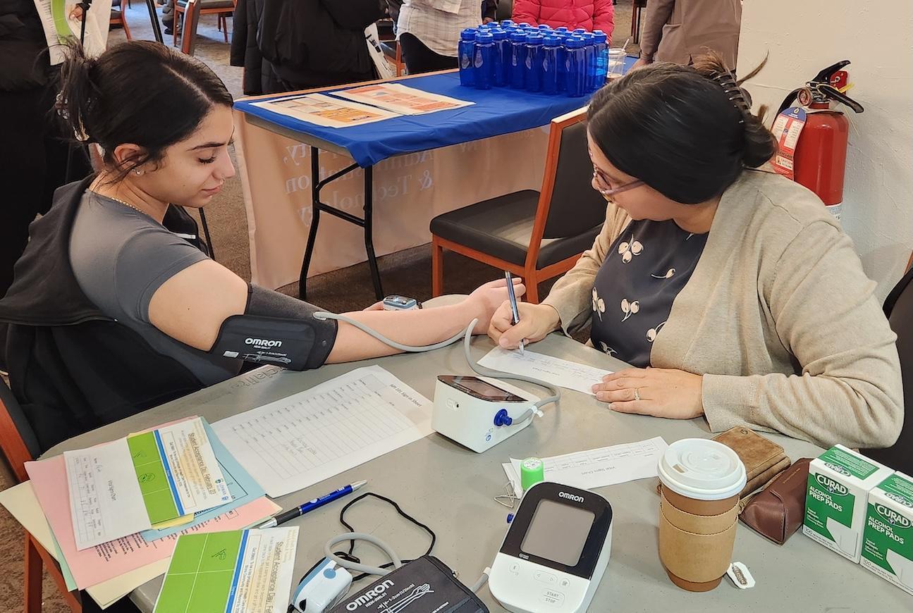 Student getting their vitals checked