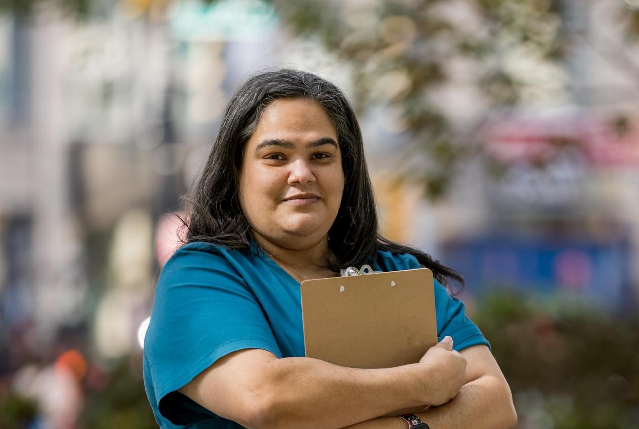 Nursing Standing outside with a clipboard